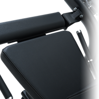 Close-up ofInsight Fitness Leg Curl/Extension - BE8025 seat with armrests on a white background