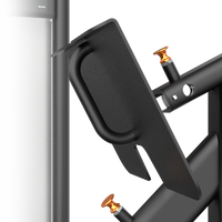 Close-up of a black metal bracket with gold screws on a white background